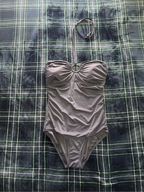 Michael Kors Navy blue one piece swimsuit w/halter tie top. Size 12.